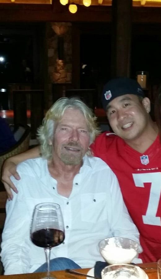 Tejune Kang with Sir Richard Branson on Necker Island
